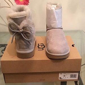 Gray Ugg mini boot with bow tie brand new size 6 with original box